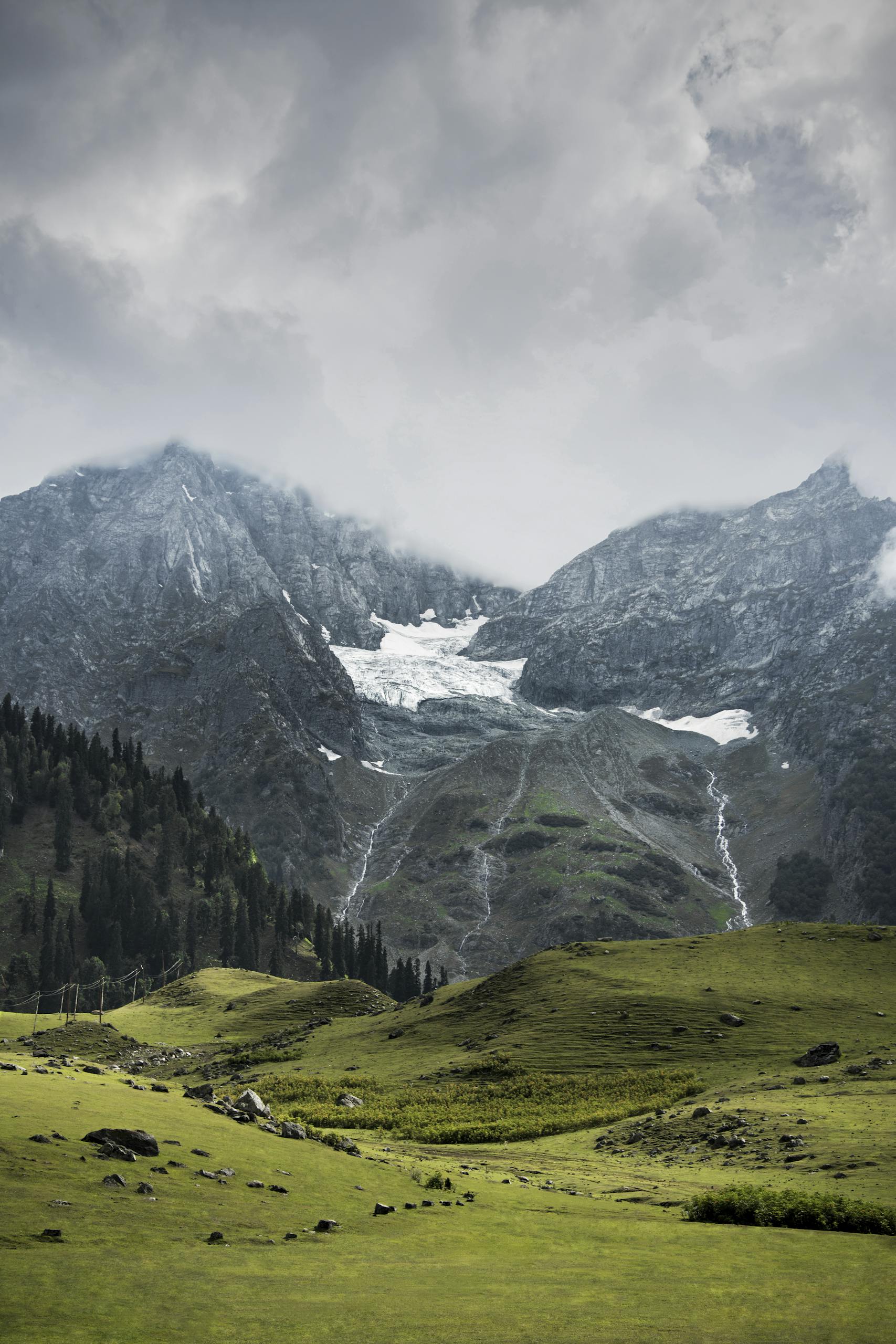 Stunning winter mountain landscape featuring snow and serene meadows in Jammu and Kashmir.